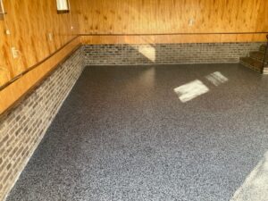Completed decorative flake garage floor by Total Concrete Coatings & Polish