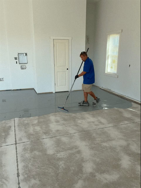 Garage floor coating project in Four Oaks NC showing concrete preparation and coating installation