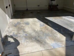 Concrete crack repair before garage floor coating